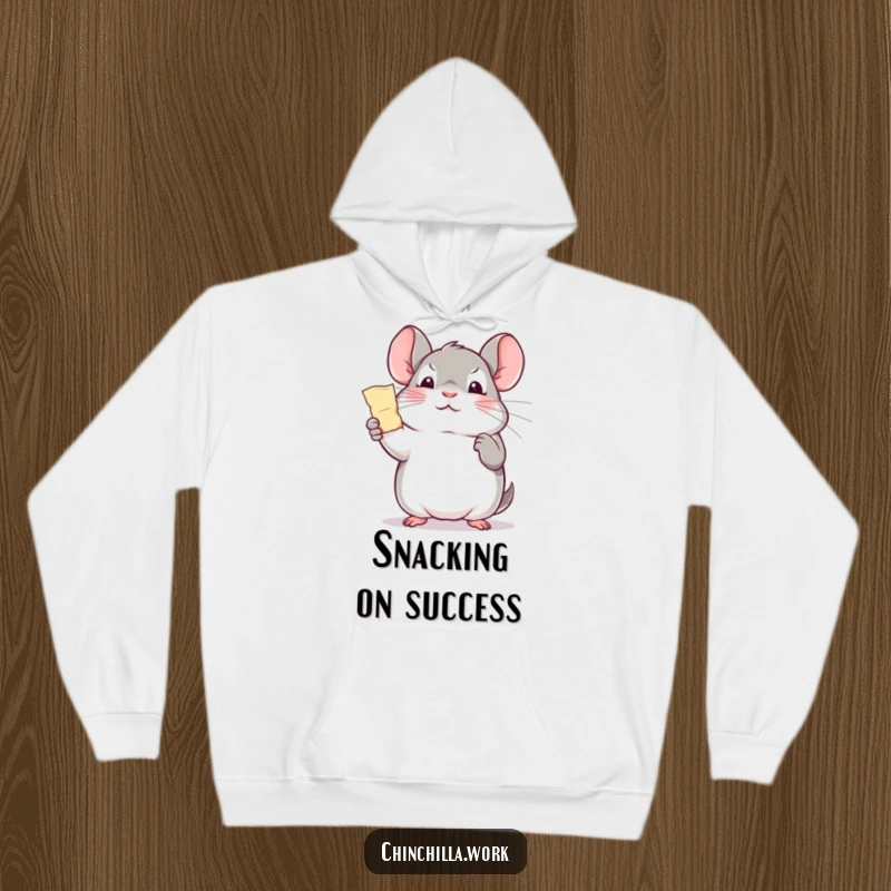Funny cozy office chinchilla hoodie, triumphantly holding a paper shred, offering comfort and a humorous celebration of success.