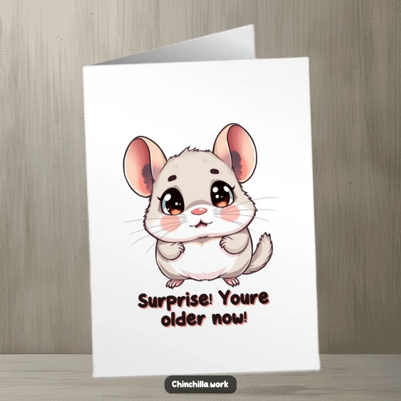 Funny free printable birthday card: a chinchilla with bugged-out eyes stares shocked at a memo, ready for printing.