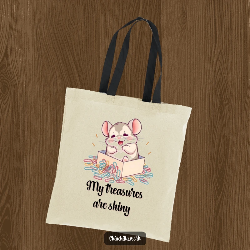 Funny Chinchilla Tote Bag showing a happy chinchilla rolling ecstatically in a pile of spilled paperclips, a very amusing accessory.